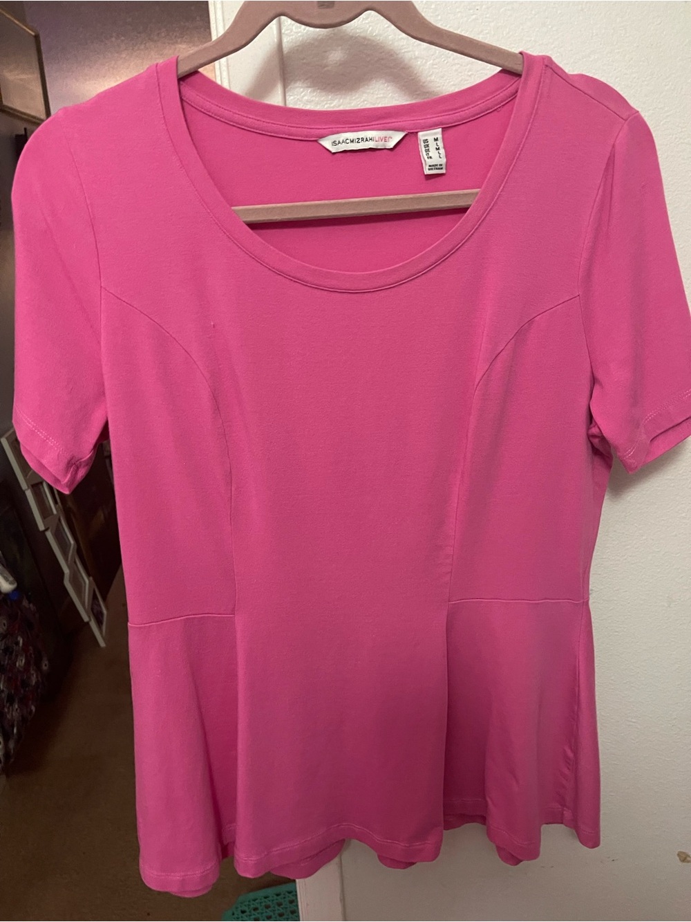 Women’s pink peplum shirt.  Isaac Mizrahi